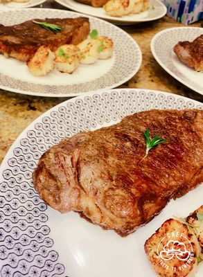 New York strip steak and seared scallops