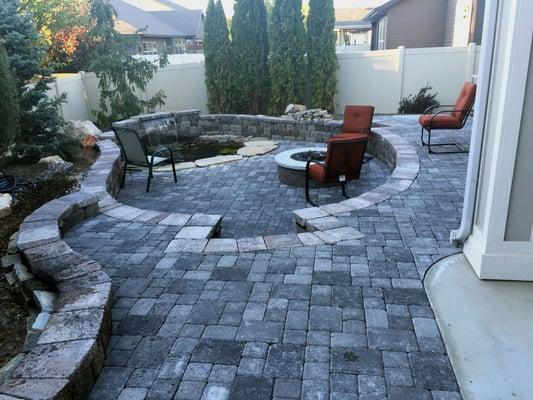 Client back patio. We did the rock work installation and design.