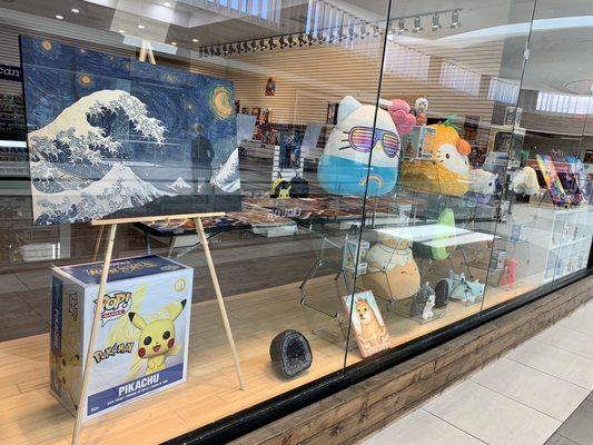 Window Display (M saw Pikachu; I noticed the portrait that reminded me of the Starry Night)