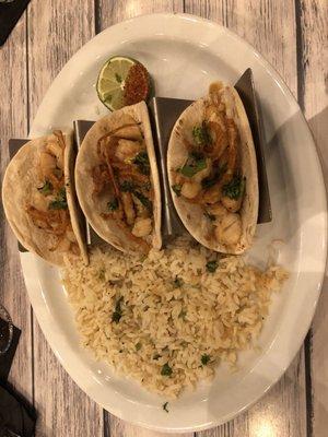 The seafood tacos and cilantro rice. The rice wasn't fully cooked; hard and grainy. The tacos taste like ceviche on a tortilla.