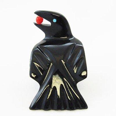 Raven with berry. Black marble and turquoise hand crafted by Zuni artist Calvert Bowanie.