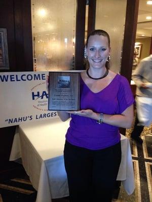 Crystal Hoffman receiving the Health Underwriter of the Year Award, June 2014.