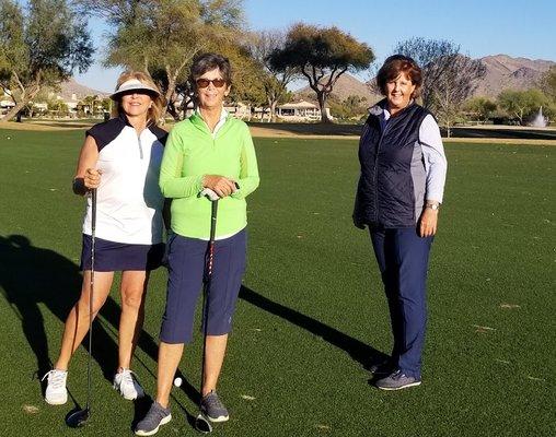 Karen (on right)coaching ladies on the course.