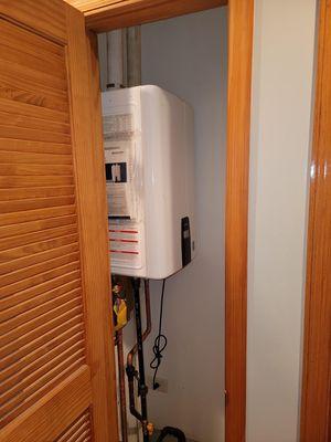 Navien tankless installed in an upstairs closet