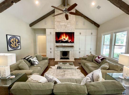 Aggieland Lookout | Living room with 2 additional TVs located in the cabinet so no one misses a game!