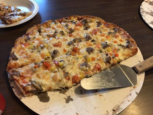 The Chumly Special. Pepper, onions, sausage, mushrooms, lots of cheese.