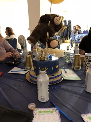 Center piece on one of many tables surrounding dance floor