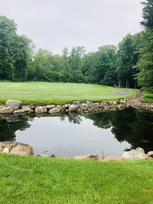 Approaching the green over water on Hole # 13 - Par 5.