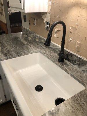 This is the kitchen. Please excuse the back splash. It will come in a couple weeks. They did a great job installing my farmhouse sink