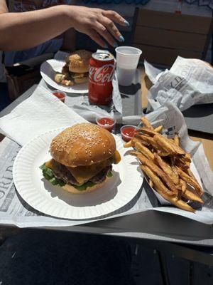 My order!! A cheeseburger with real cheddar. Fresh. Two pattys smash burger style. Full! And fresh and fresh fries!