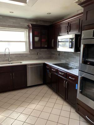 After picture, new counters, new back splash and new cabinet for new double ovens