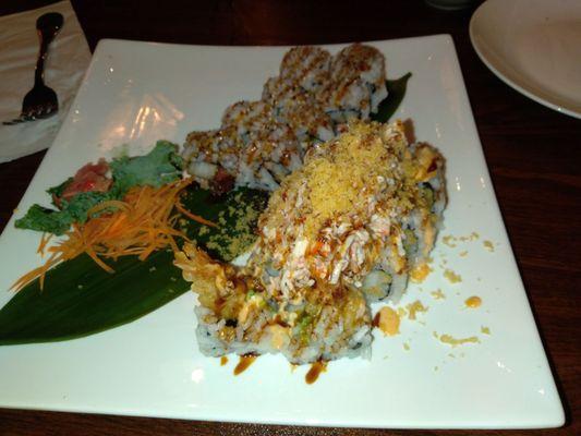 Eel roll and the rock roll with shrimp tempura, krabby salad on top with eel and shrimp sauce