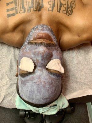 Charcoal Mask after cleansing, exfoliation, and facial massage