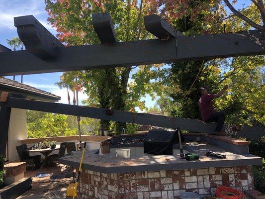 Bringing this beast of a Pergola down.