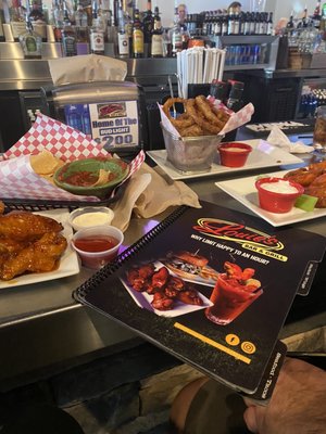 Chicken wings and onion rings