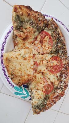 Pesto pizza and cheesy garlic bread slice