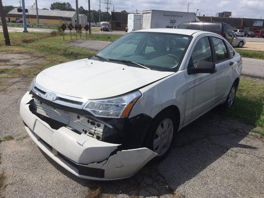 Initial before photo of front end damage.