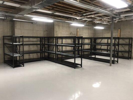 Shelving and grey Epoxy Flooring for a customers basement