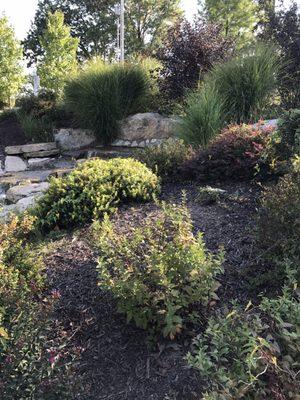 Lovely little park w/a playground for ages 2-5, benches, hilly path, waterfall, gazebo, picnic tables, pavilions, grills & porta potties.