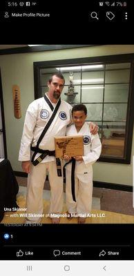 Mr.Wright recieving his black belt plaque