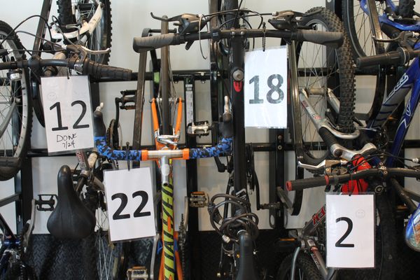 Rack of customer bikes in for service