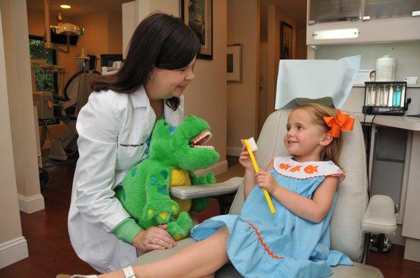 Dr. Ashley Covington & pediatric dental patient.