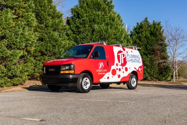 Our brand new, sharp, recognizible plumbing van.