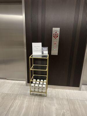 Just prior to the private elevator up to the Sky Club, complimentary boxed water!