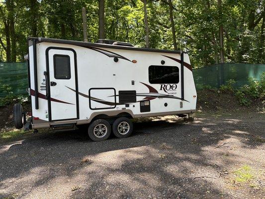 21'Rockwood Roo , front and rear pop out queen beds , slide out and a large dinette that make a large bed .