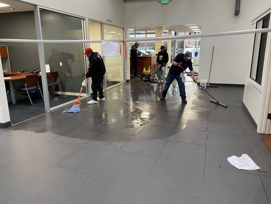 Our employees are preparing this tile to be waxed.