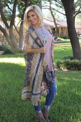 http://www.poshponyboutique.com/tops/under-pressure-kimono.html