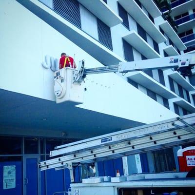 One of our two huge signs getting installed at our new office in North Bay Village.