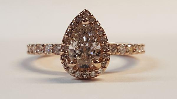 Rose gold pear shape engagement ring