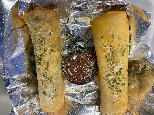 Punks Pizza Rolls! Home Made Marinara, Pepperoni, Mozzerella Cheese, Red Pepper Flakes - Deep fried in 12" Tortilla.