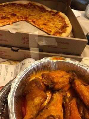 Pizza Pizza large plain cheese pizza Dozen Buffalo Wings Dozen Buffalo Wings