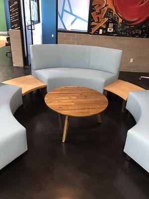 Custom 7ft quarter round sectional pieces made for the company Equality health. We also made the end tables