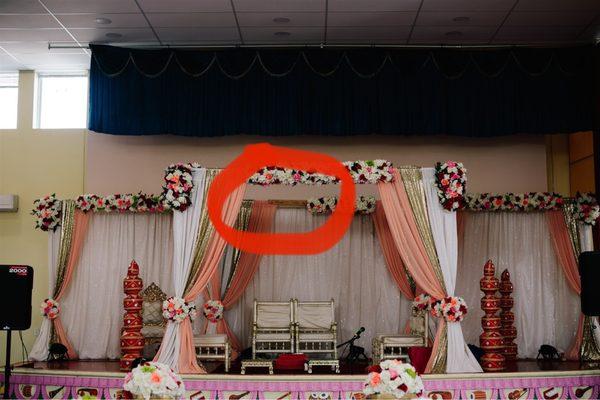 Our mandap fell and you can see the wood sticking out.