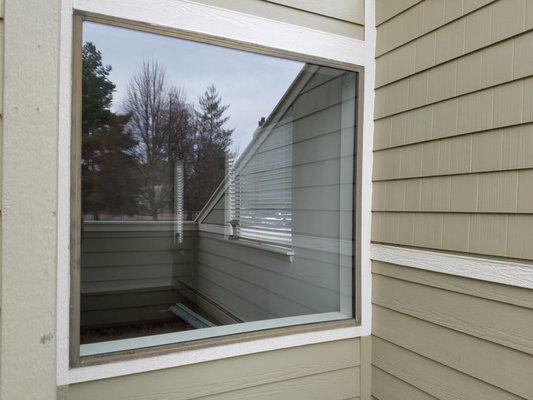 We replaced the foggy window in this customer's existing frame by changing out the glass without replacing the entire window.