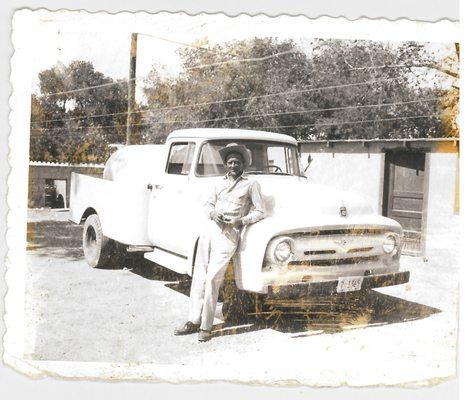 Johnny Suggs with a brand new pump truck in 1956