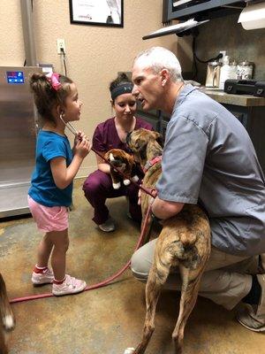 Dr. Jim letting one of my kiddos listen to another's heartbeat.