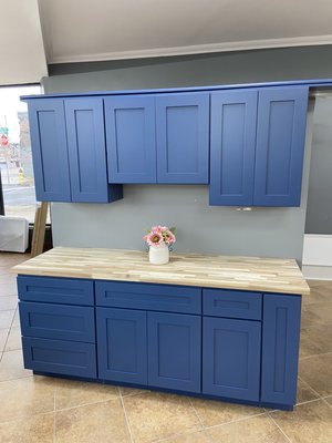 Blue Cabinets with butcher block