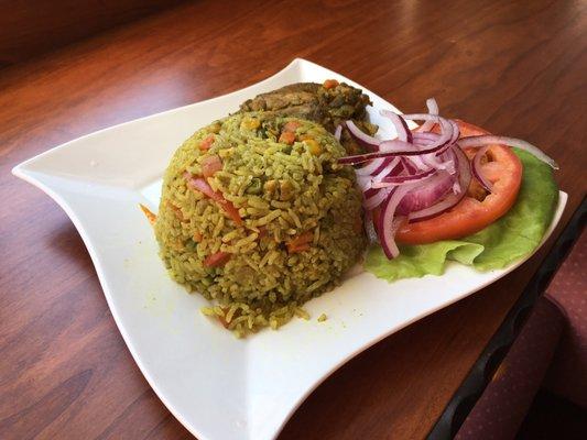 Green rice with chicken , cilantro,peas, carrot, red pepper and spices .every Friday