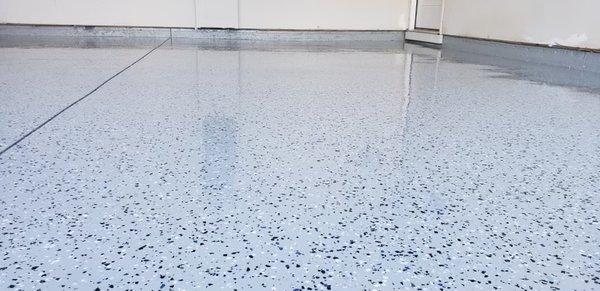 Light gray epoxy with a mix of flake