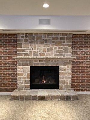 New direct vent gas fireplace and stone surround