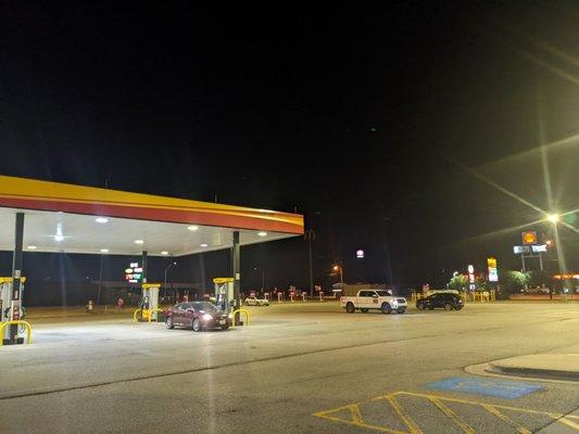 Tesla supercharger and gas station