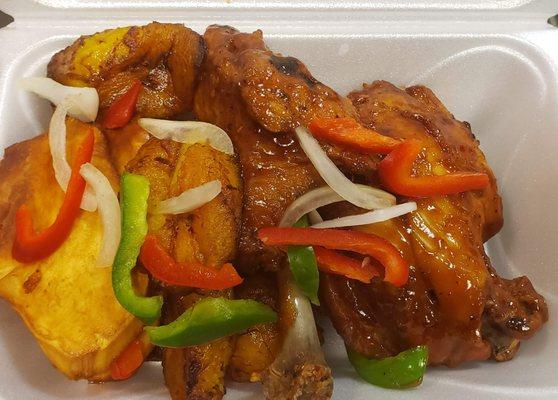 BBQ wings platter with fried plantains or French fries.