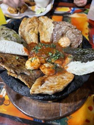 Molcajete (more meat than sauce unlike other local places)