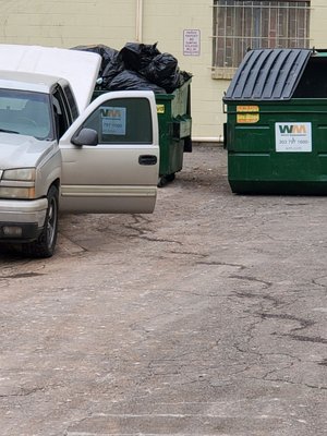 FYI.. To whoever owns this shopping center.. I caught this truck dumping 7 40 gal. Black bags into the waste containers.