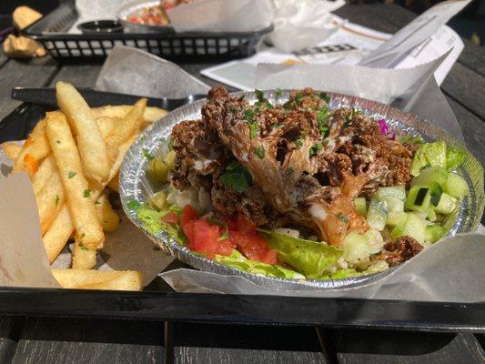 Fries were the highlight. Fresh, hot and tossed in whipped garlic butter. Fried cauliflower bowl on top of rice and salad mix.