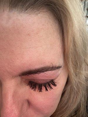 Lash extensions clumped together and hardened